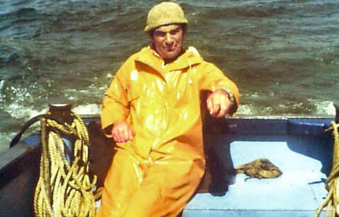 Thumbnail - Arthur at the helm of his beloved fishing boat Wishbone.  Photograph John Broomhead.
